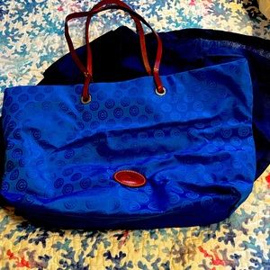 Authentic Dooney and Bourke Chicago cubs shoulder bag.